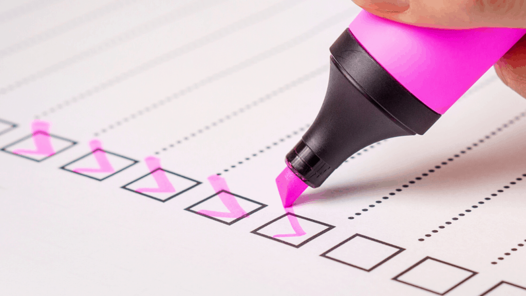 Checklist with pink highlighter. 