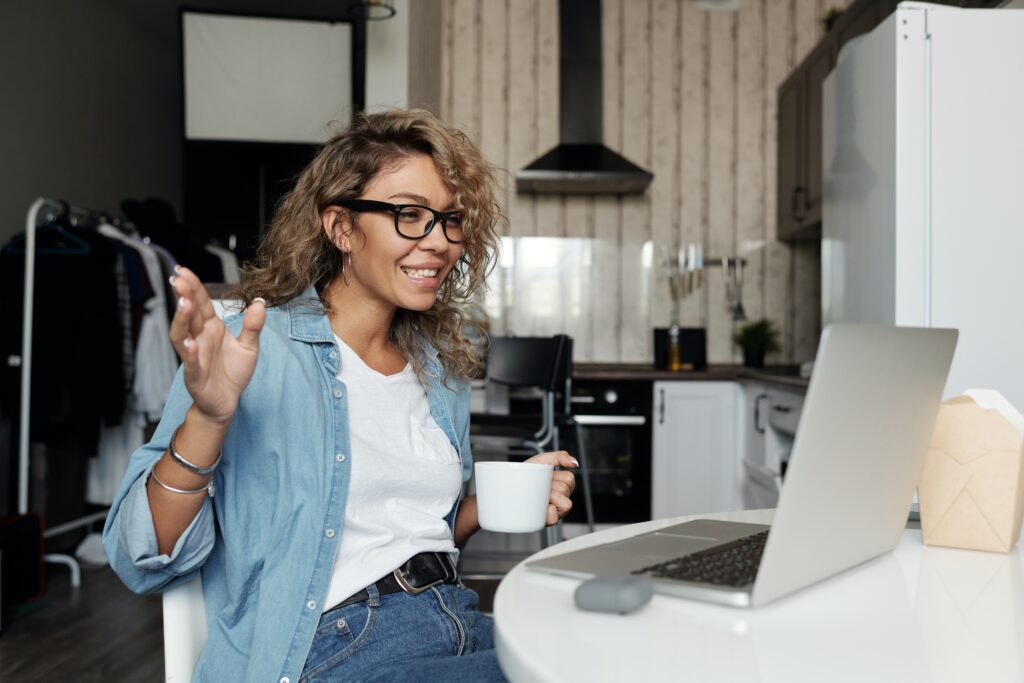 Woman talking to someone via webcam