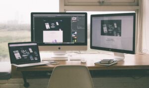Computer monitors on a desk