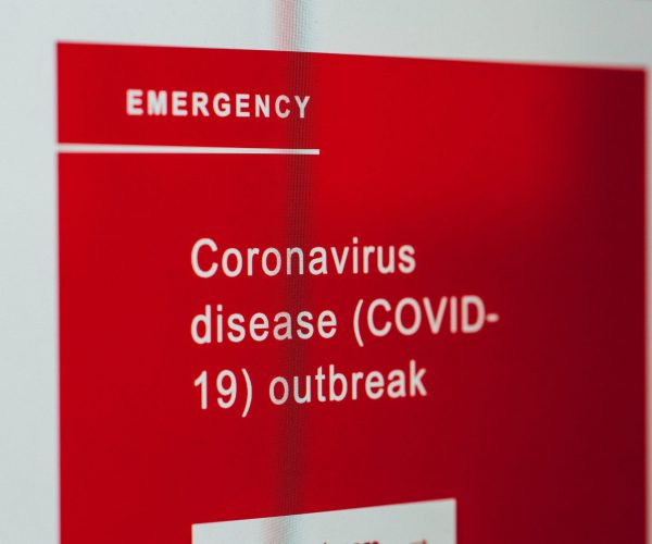 Emergency red sign about Coronavirus disease outbreak